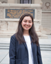 picture of Lauren Gatta in front of the WWI memorial on Beinecke Plaza