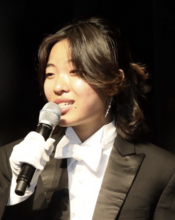 singer in tux with mic